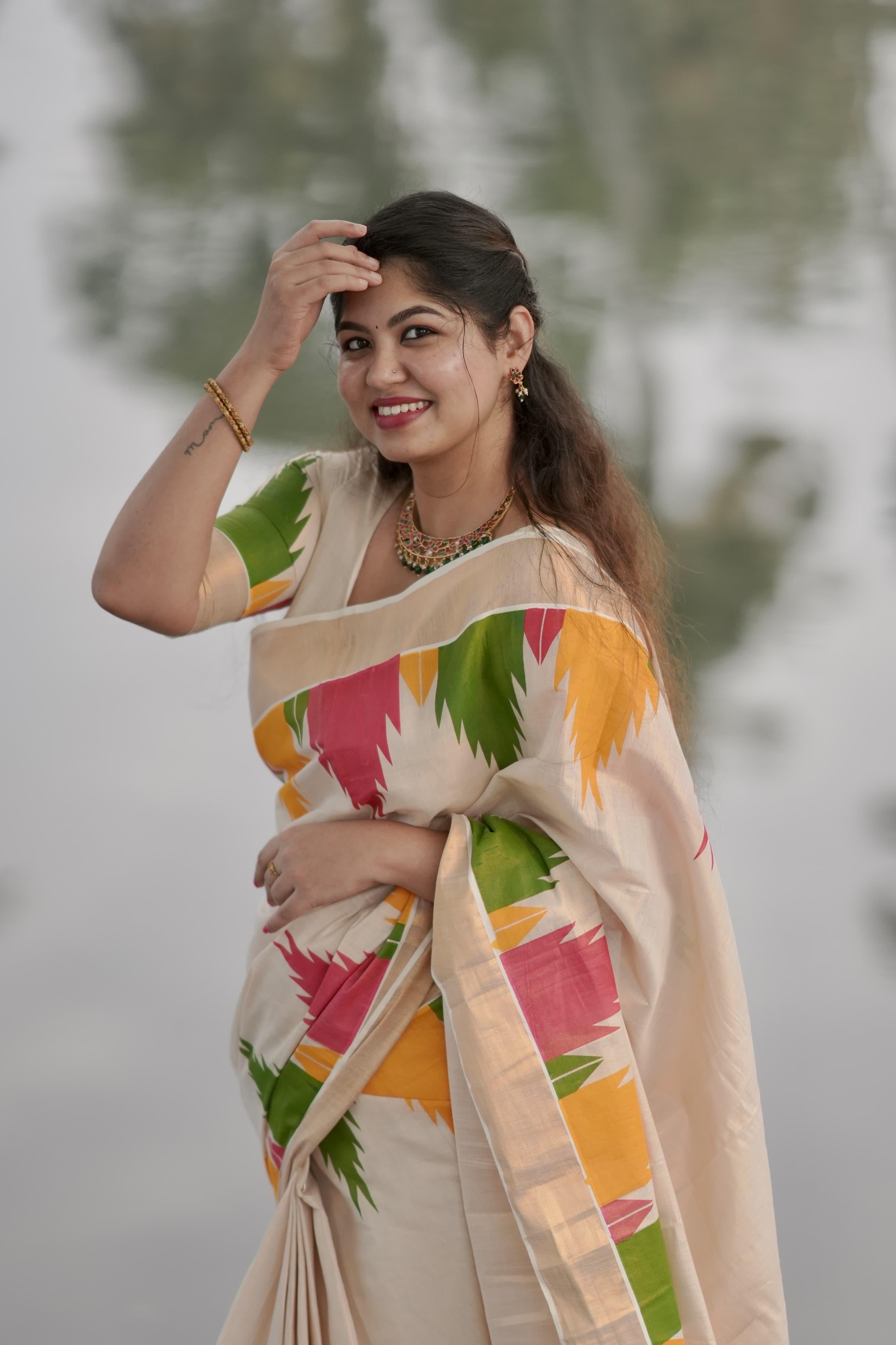 Multi colour temple golden tissue saree