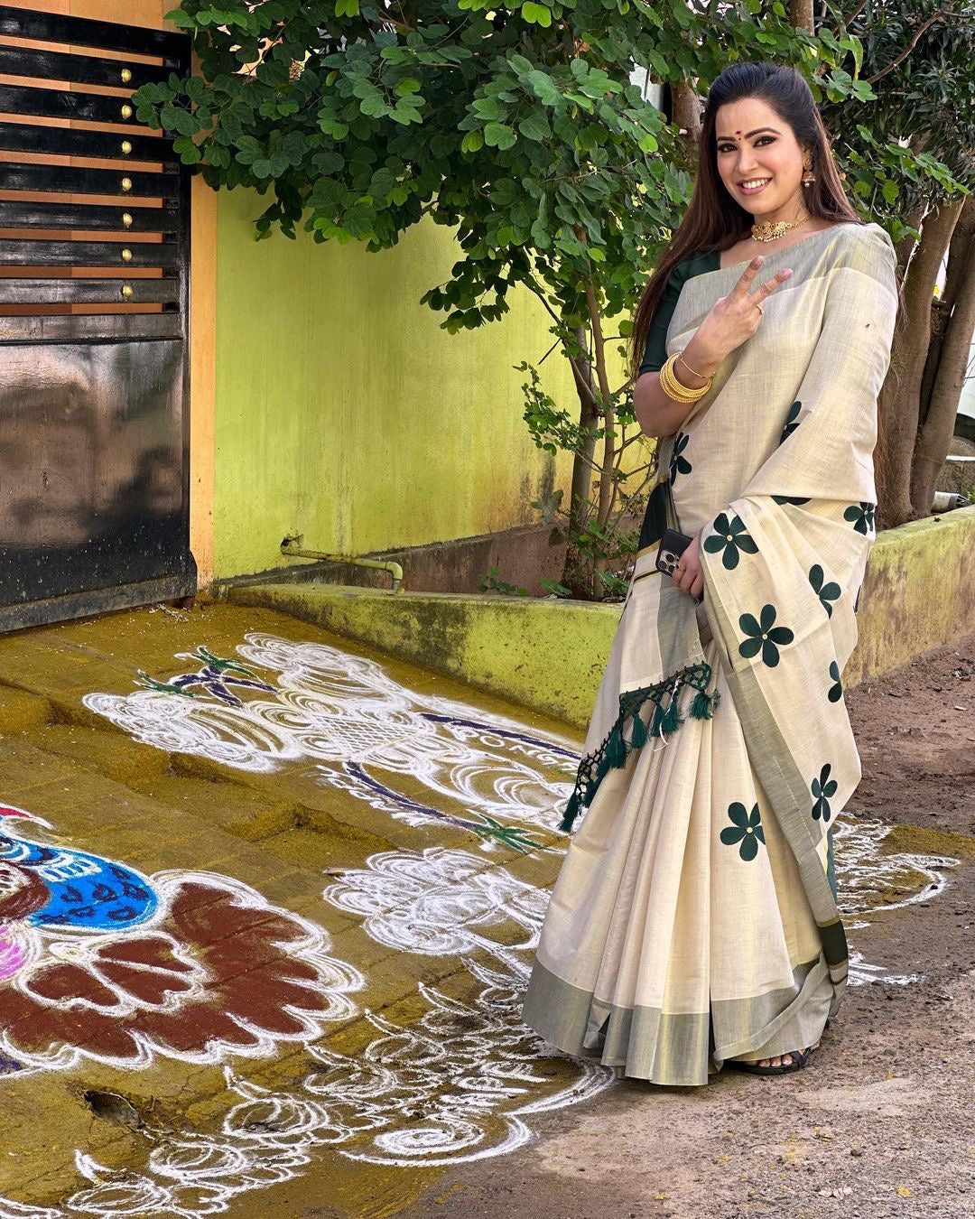 Green Flower Embro Golden Tissue Saree with Tussles