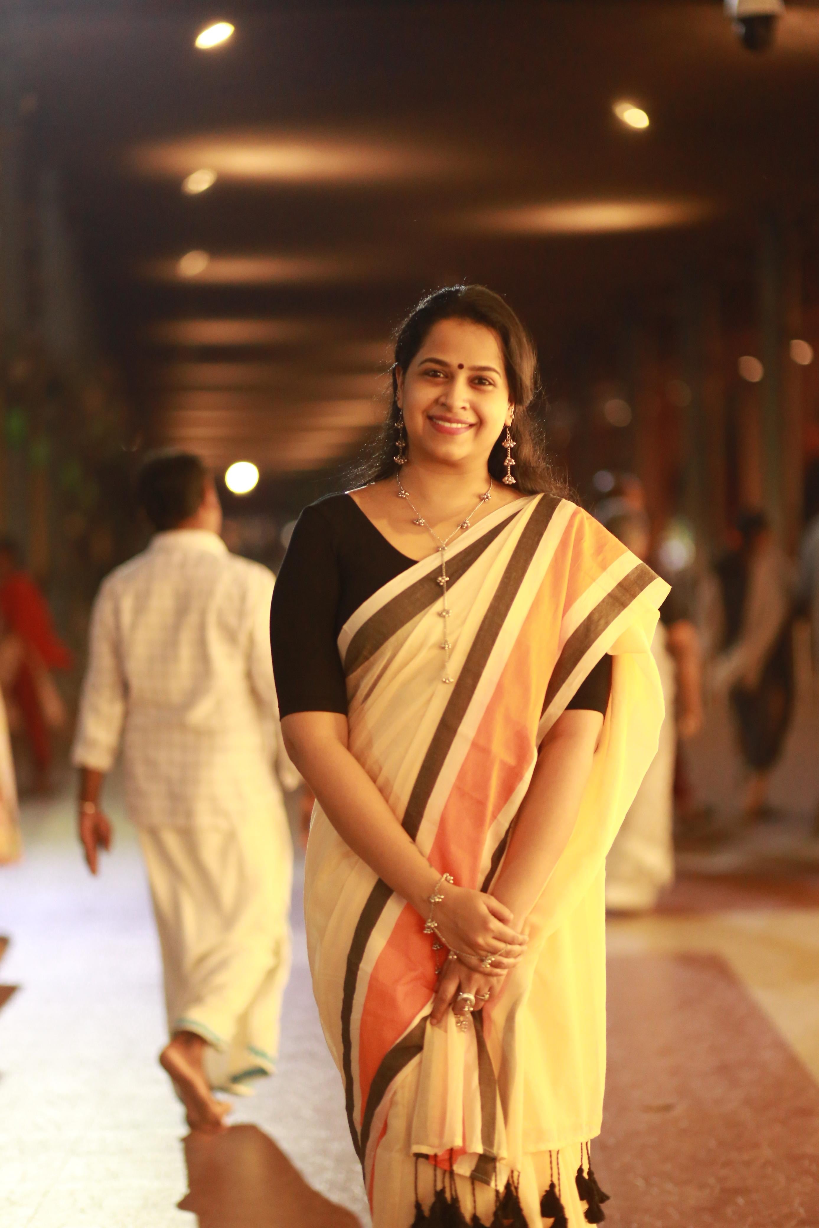 Black and Orange mul mul saree